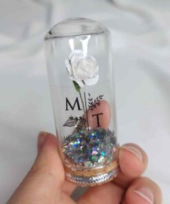 Fleur en Fiole avec Paillettes Argentées